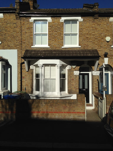 Installed new front door and two sash windows in London