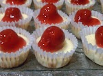 Delicious Mini Cheesecakes was pinched from <a href="http://texasfarmersdaughter.com/delicious-mini-cheesecakes/" target="_blank">texasfarmersdaughter.com.</a>