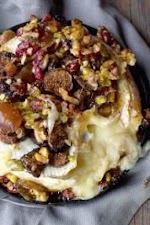 A French Baked Brie Recipe with Figs, Walnuts and Pistachios was pinched from <a href="http://www.themediterraneandish.com/baked-brie-recipe/" target="_blank">www.themediterraneandish.com.</a>