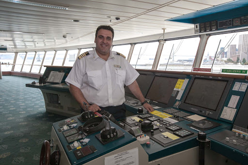 Celebrity-Infinity-captain-on-bridge-2 - Captain Michael Sympouras on the bridge of Celebrity Infinity before a 12-day San Francisco-to-Alaska sailing. 