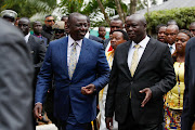 Kenya's Deputy President William Ruto and presidential candidate for the United Democratic Alliance (UDA) and Kenya Kwanza political coalition walk before the announcement of the results of Kenya's presidential election , in Nairobi, Kenya August 15, 2022. 