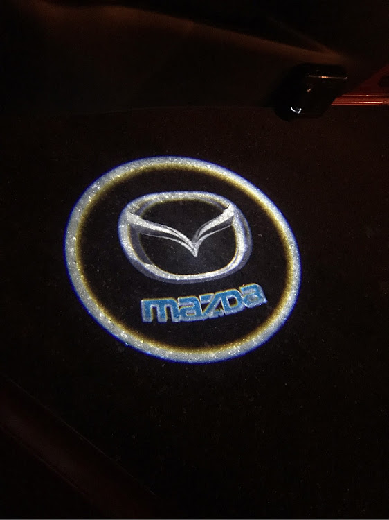 デミオのデミオ・マツダ・プロジェクター・カーテシランプに関するカスタム事例の投稿画像1枚目