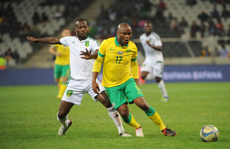 Tokelo Rantie of South Africa is challenged by Khassa Camara of Mauritania during the AFCON Qualifier match between South Africa and Mauritania 02 September 2016 at Mbombela Stadium.