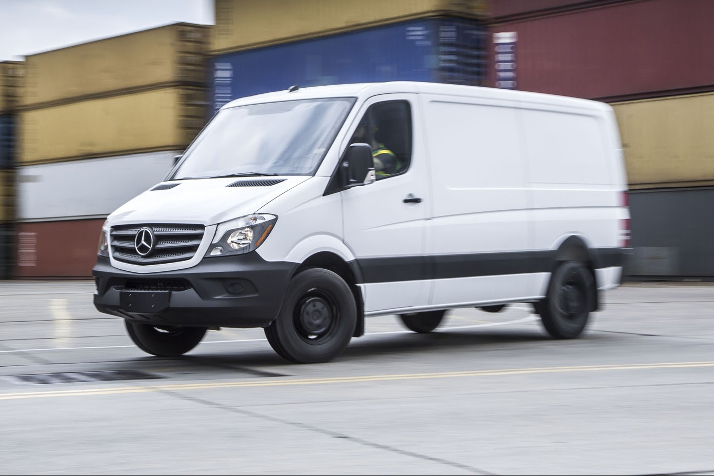 2016 Mercedes Benz Sprinter Worker front three quarters in motion 02