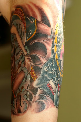 Tribal half sleeve tattoos are good because you can express a lot by it.