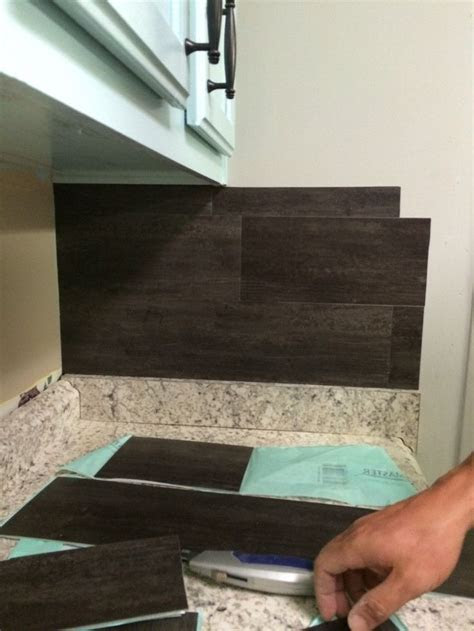Diy home improvement is a very satisfying activity. Our $40 Backsplash {Using Vinyl Flooring | Vinyls, Stove