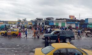 People walk past the empty Red Light market in Monrovia&nbsp;&hellip;