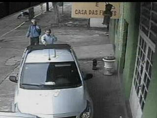Frame from a security video camara taken just seconds before gunman shoots dead a business man in Rio Grande do Sul, Brazil