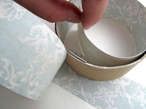 Step 14) Stick the final strip of patterned paper on the inside of the bottom ring