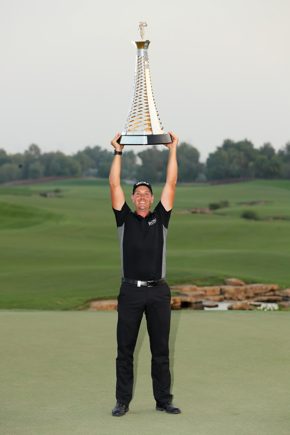 DUBAI, UNITED ARAB EMIRATES - NOVEMBER 20:  Henrik Stenson of Sweden poses with the Race to Dubai trophy during day four of the DP World Tour Championship at Jumeirah Golf Estates on November 20, 2016 in Dubai, United Arab Emirates.  (Photo by Andrew Redington/Getty Images)