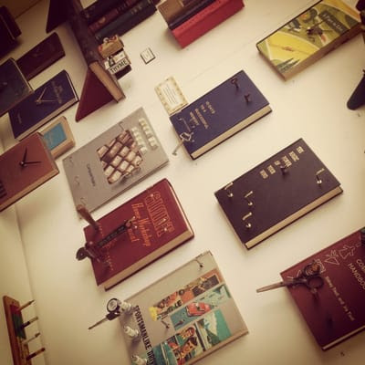 Cool--repurposing books for wall decor (clocks, hooks) | Yelp