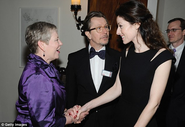 Meet and greet: Dame Barbara met the stars, including Oldman and Edenborough who looked stunning in a high necked black dress with shoulder slits