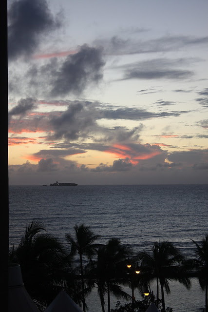 cargo ship at dusk, waikiki