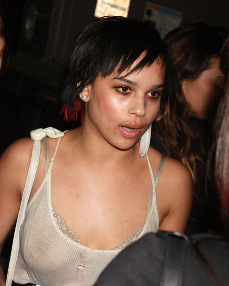 This is Zoe Kravitz in a see through shirt She's Lenny Kravitz's Daughter