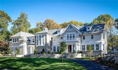 Of all the things that technology has afforded us, the garage door opener might be one of the most underrated technologies. OUTSTANDING NEW HOME IN COVETED WELLESLEY FARMS