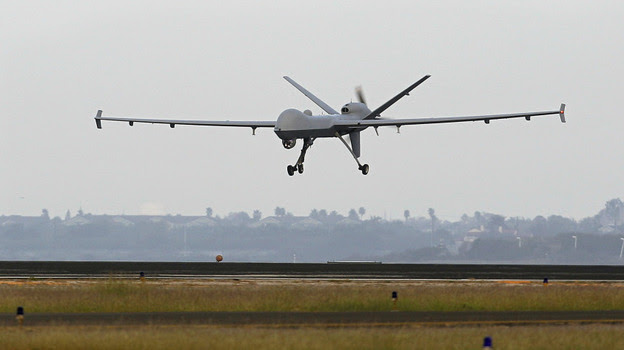 A Predator B unmanned aircraft lands after a mission at the Naval Air Station last November in Corpus Christi, Texas. 
