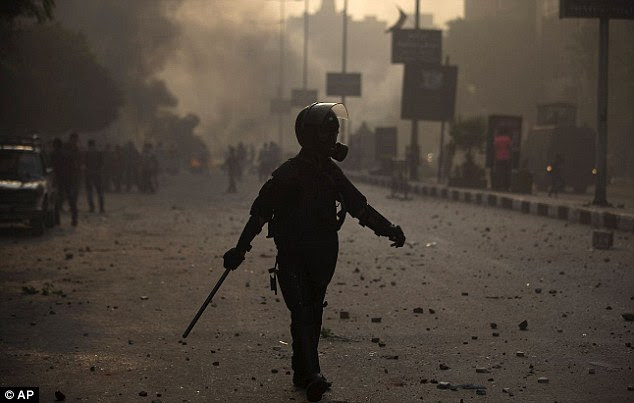 Panic on the streets: Cairo has witnessed violent disturbances since the ousting of Mohamed Morsi