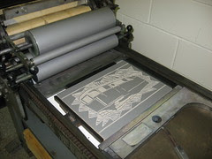 Trailer linoleum block on the press