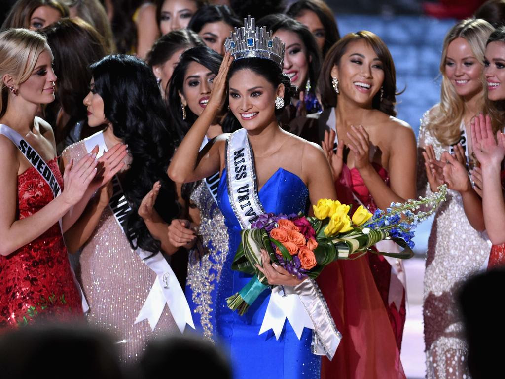 Miss Philippines 2015, Pia Alonzo Wurtzbach who was mistakenly named as First Runner-up reacts with other contestants after being named the 2015 Miss Universe during the 2015 Miss Universe Pageant. Picture: AFP