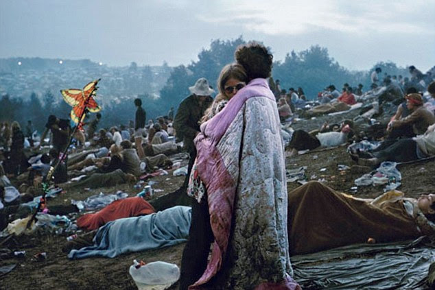 Iconic: This image of Bobbi and Nick Ercoline, wrapped in a muddy blanket, became one of the most well-known photographs of Woodstock
