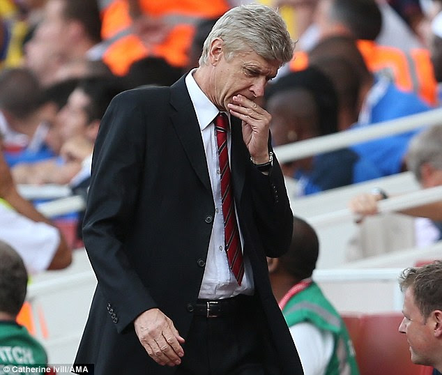 Further woe: Wenger was left disappointed as Drogba inflicted more damage on his Arsenal side