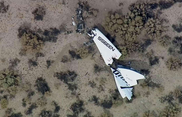 This image from video by KABC-TV Los Angeles shows wreckage of SpaceShipTwo in Southern California's Mojave Desert on Friday, Oct. 31, 2014. A Virgin Galactic space tourism rocket exploded after taking off on a test flight, a witness said Friday.