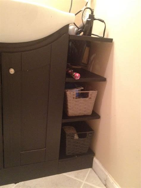 Illuminated bathroom wall mirrors radiate brilliance and glam up the interior. Nice little shelves to fill the gap between the vanity and