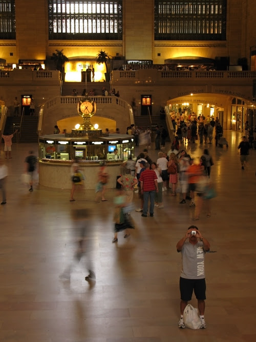 tourist Bob takes a photo in the main hall of Grand Central Station, Manhattan, NYC
