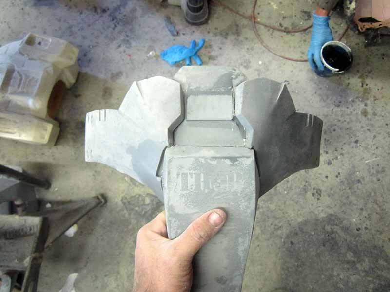 attaching belt parts to codpiece