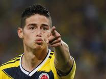 Colombiano James Rodríguez comemora gol contra o Uruguay no Maracanã.  28/6/2014.  REUTERS/Sergio Moraes