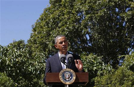 U.S. President Barack Obama makes a statement about the violence in Egypt while at his rental vacation home on the Massachusetts island of Martha's Vineyard in Chilmark August 15, 2013. REUTERS/Larry Downing