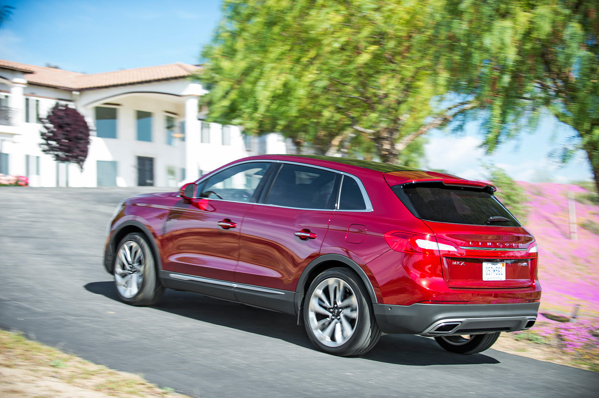2016 Lincoln MKX AWD 27 EcoBoost rear three quarter in motion