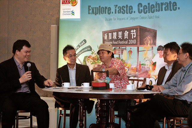 Emcee Joe Augustin with the panelists