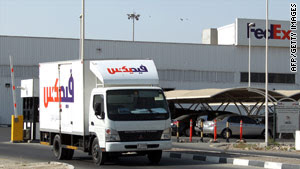 A truck leaves the FedEx terminal in at the Dubai airport on Saturday.