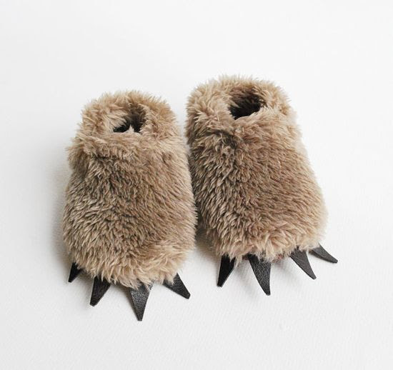 Fuzzy slippers for your little monster.
