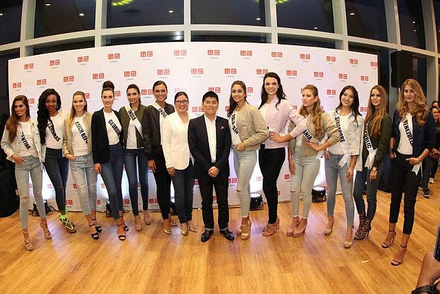 Miss Universe candidates wear Uniqlo’s latest collection during their visit to the brand’s store at SM Seaside City Cebu. With them are Uniqlo  marketing director Georgia Velasco and Uniqlo COO Katsumi Kubota.