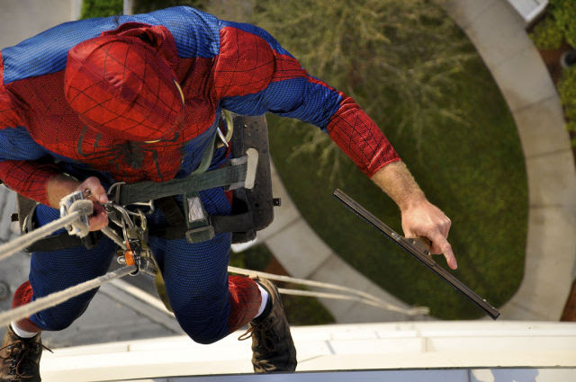 Superheroes Take Time Out to Clean Windows