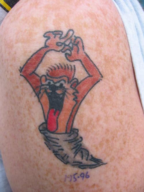 Zack: Tattoo by Jimmy Redfield, Age 8. Dr. Thorpe: Taz looks like he lost a 