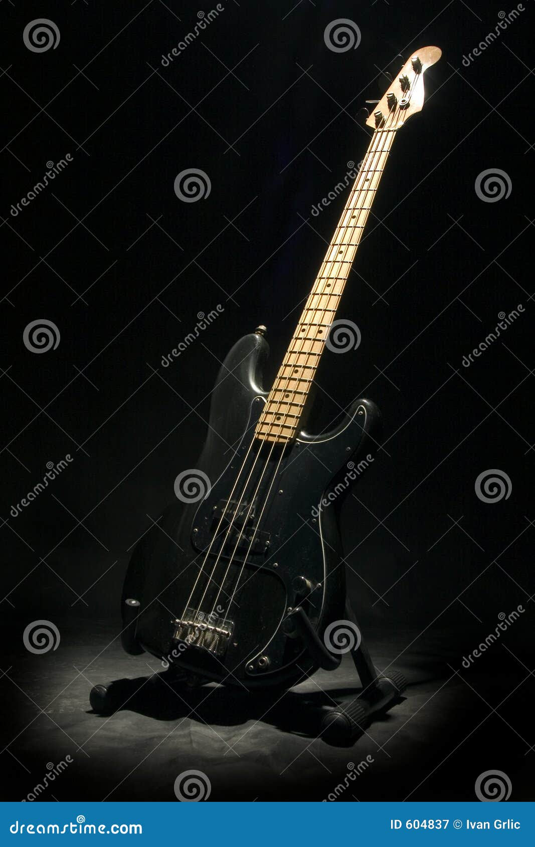 Bass guitar in dark
