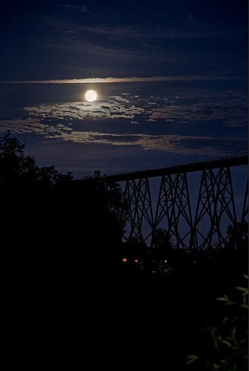 A 3-exoposure of the full Moon on July 12, 2014, taken near Cap-Rouge, Quebec City, Quebec, Canada. Credit and copyright:  Denis Marquis. 