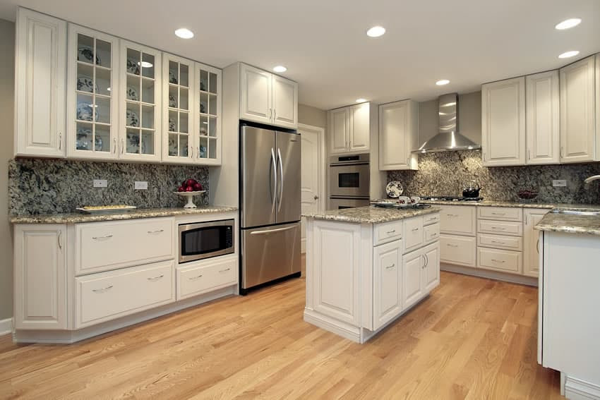 darkish kitchen cabinets with light countertops