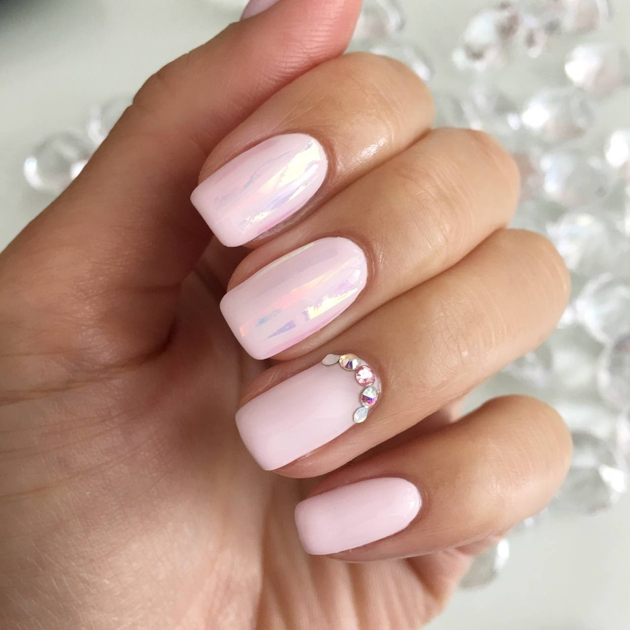 Hard Gel, Soft Gel or Gel Polish? | Sunday Beauty Boutique This photo is a picture of gel nails with a special design with pink, orange, and white.