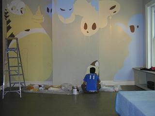 Kelly Towles Painting a Wall at Seven