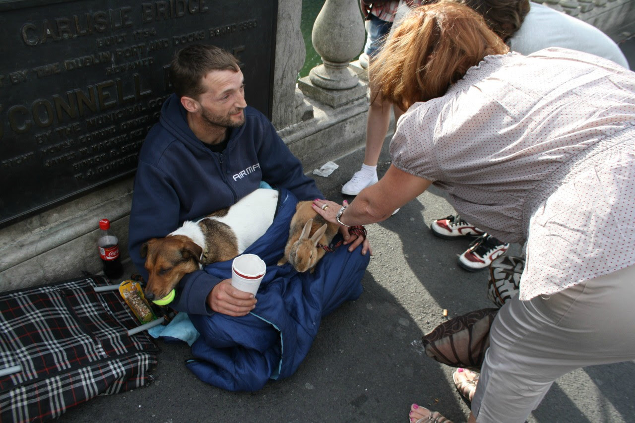 This homeless man's rabbit was thrown over a bridge by a passerby and he immediately jumped in to the river to save her and resuscitated her. He won an award, was given animal food and a job, and the passerby was charged with animal cruelty