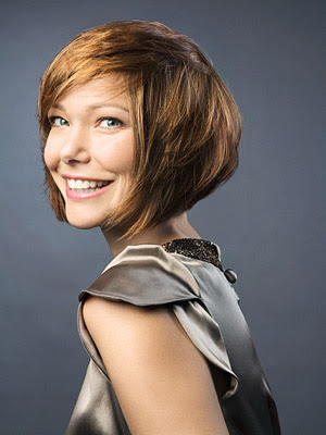 hair and she likes to wear her locks in medium length bob hairstyle.