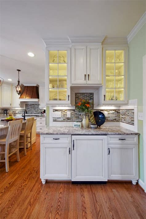 Luckily, some issues can be fixed with easy troubleshooting. Small Kitchen Bar With Glass Door Cabinets | HGTV