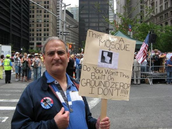 http://cloudfront.mediamatters.org/static/images/item/item-20100823-protestsign13.jpg