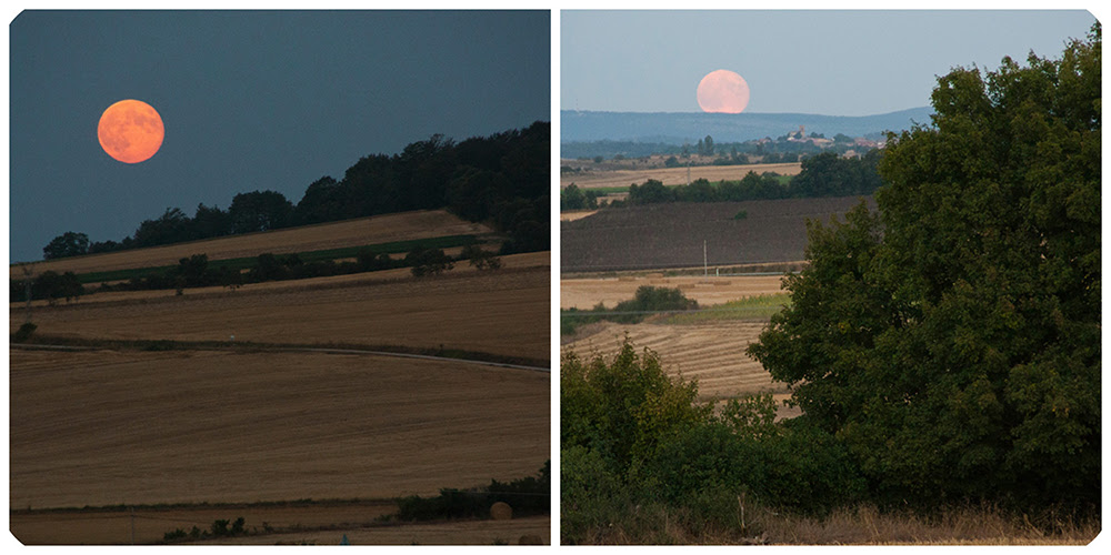 Luna espectacular en los valles cosechados de Castilla