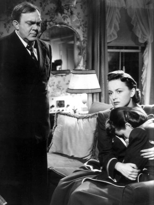 Jan. 1, 2011<br />1. The Dark Mirror (1946)<br />Starring Olivia de Havilland, Lew Ayres, Thomas Mitchell<br />Written &amp; Produced by Nunnally Johnson. Directed by Robert Siodmak <br />Plot: a film noir/mystery about identical twin sisters&#8212;one of them is guilty and one is innocent.<br />This was a very entertaining film with an incredible performance by Olivia&#8212;playing two people! The special effects were skillfully handled and impressive. I wish they would&#8217;ve explained more about the dark mirror, though. Trying to kept everything straight was a little confusing at times but the pacing was great and it really kept me interested and concentrating on the plot. 