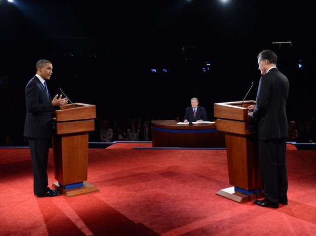 President Obama and GOP presidential nominee Mitt Romney face off during the presidential debate at the University of Denver on Wednesday as moderator Jim Lehrer looks on.